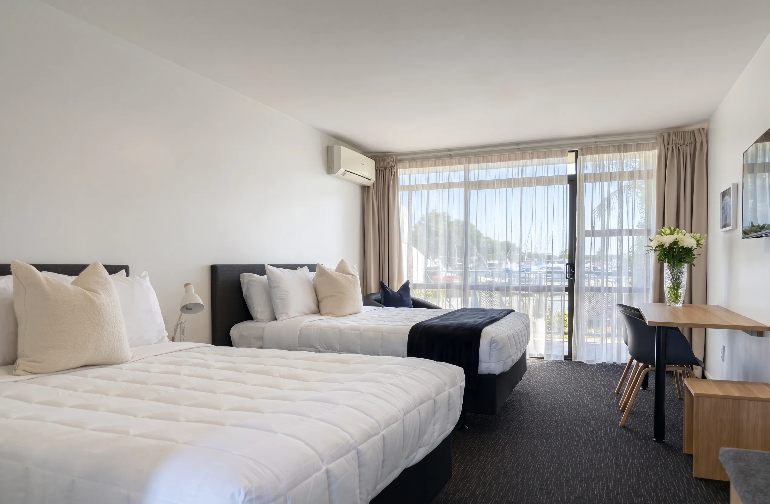 Ground Floor Twin at Bluewater Hotel, with a partial marina outlook