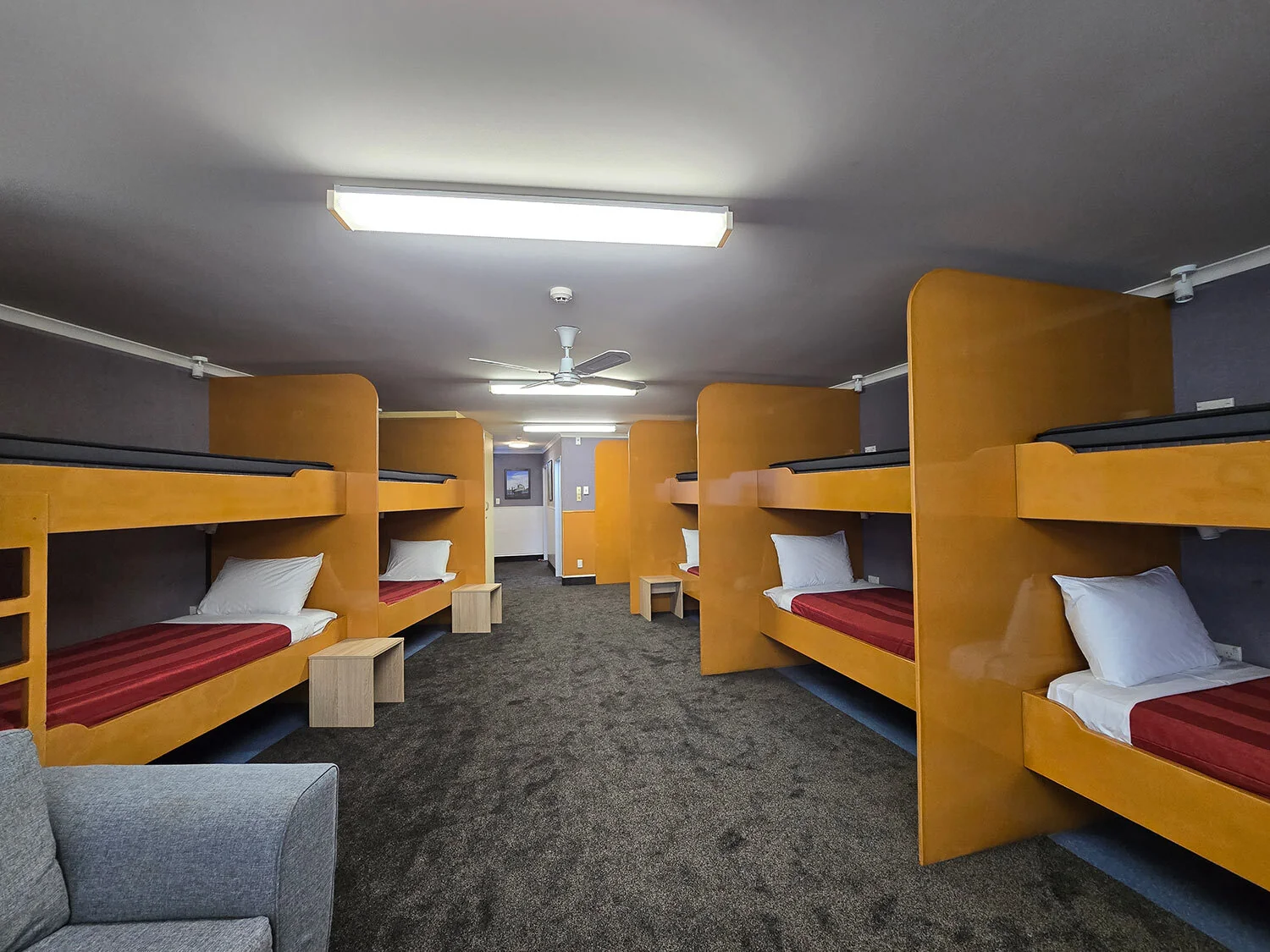 Lodge 12 Single Beds — main sleeping area at Bluewater Hotel