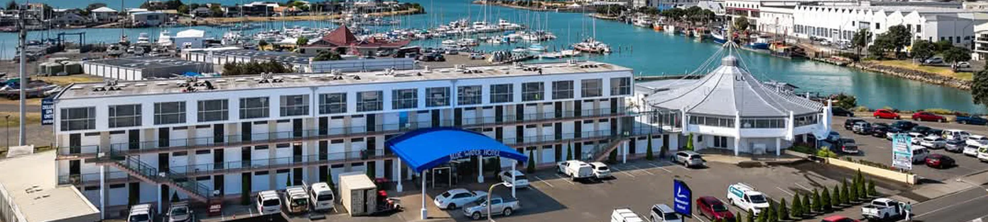 Bluewater Hotel exterior — building and round-house annex on the Ahuriri waterfront