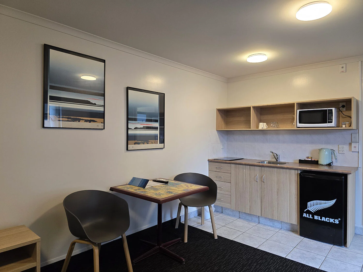 Large Studio — kitchen at Bluewater Hotel
